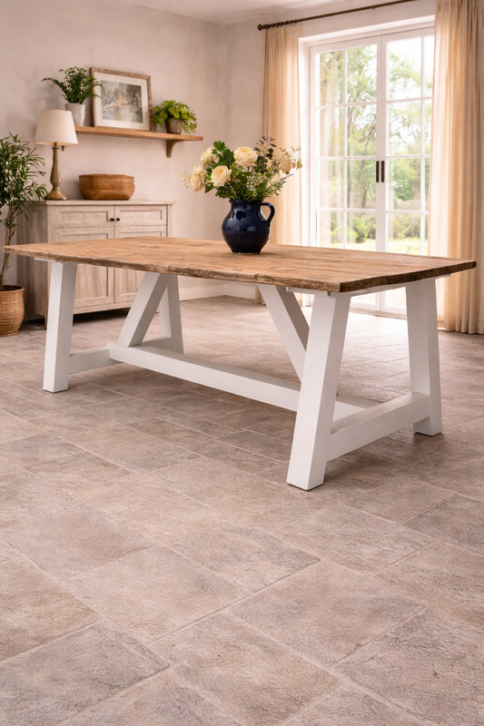 Farmhouse table with white painted legs and reclaimed wooden top