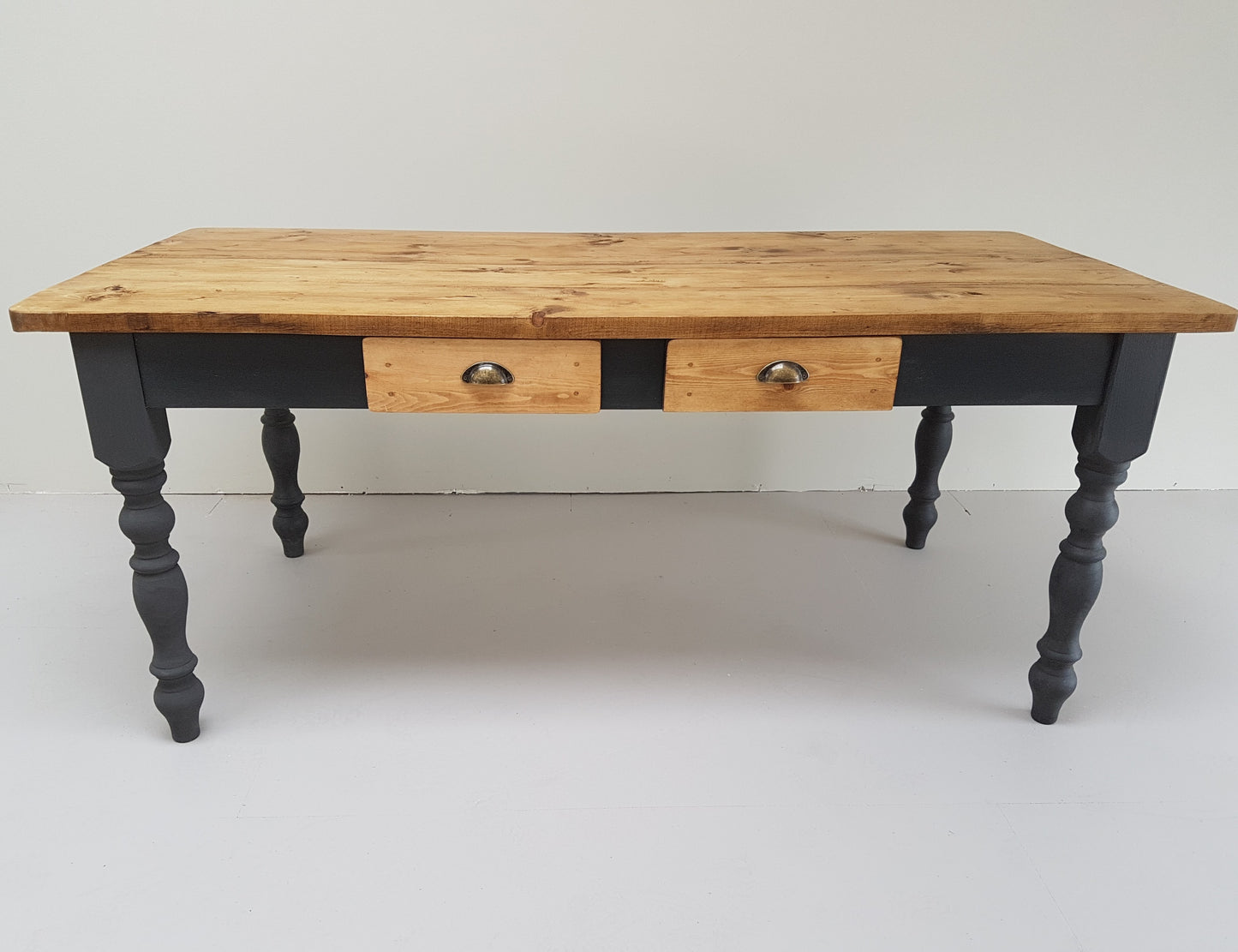 The 'Burford' table (pictured with the dark oak finish)