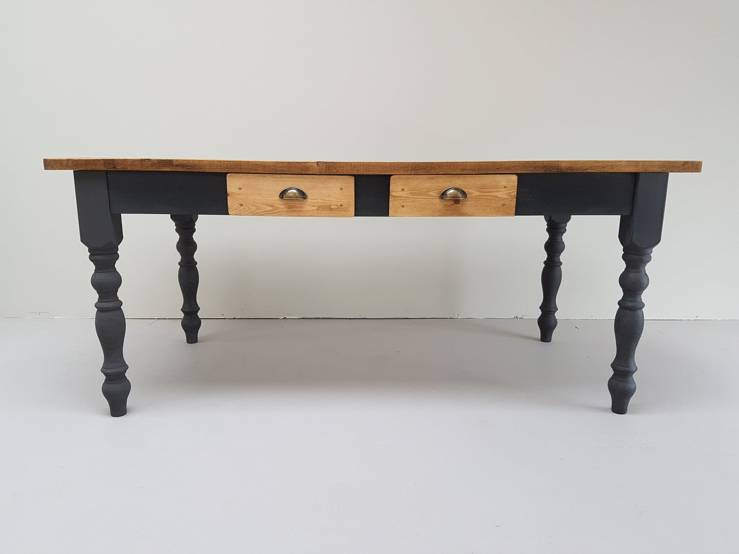 The 'Burford' table (pictured with the dark oak finish)
