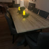 The Cross frame trestle table (pictured with the rustic pine finish)