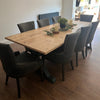 The Cross frame trestle table (pictured with the rustic pine finish)