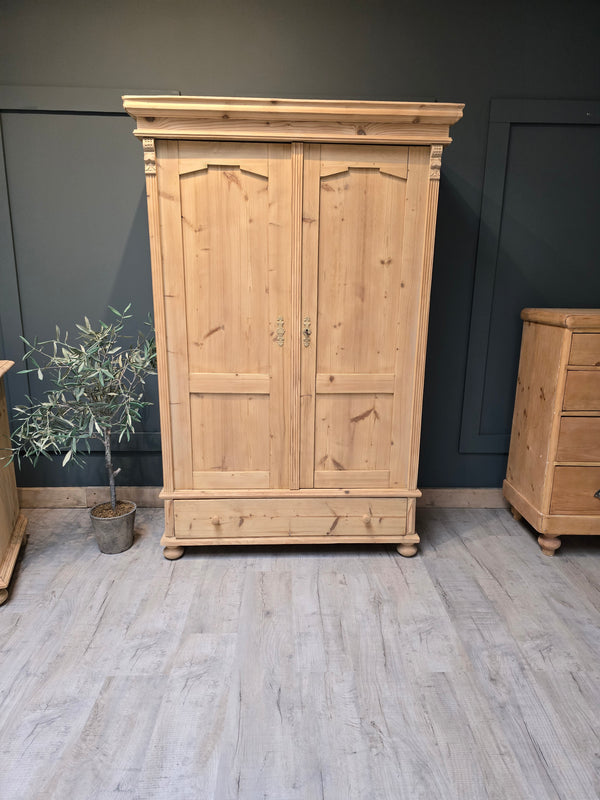 Stripped pine French wardrobe