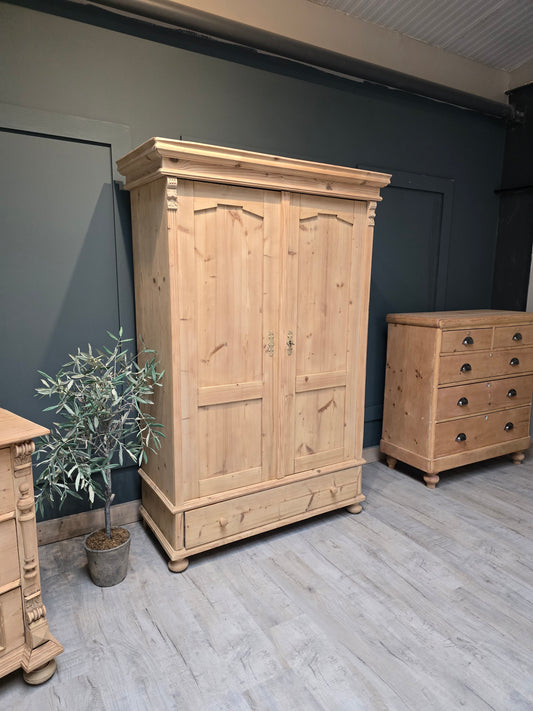 Stripped pine French wardrobe