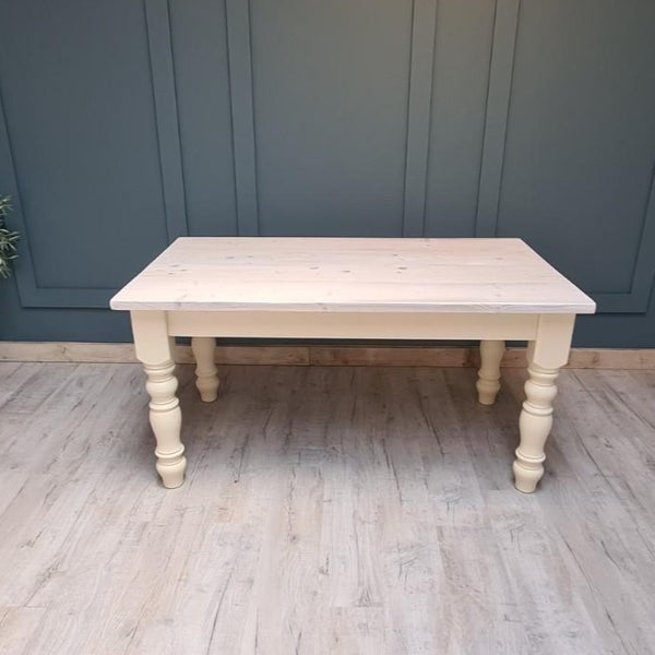 The Holkam whitewashed dining table with two removable extensions