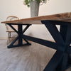The Cross frame trestle table (pictured with the rustic pine finish)
