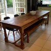 Rustic farmhouse table with benches and chairs